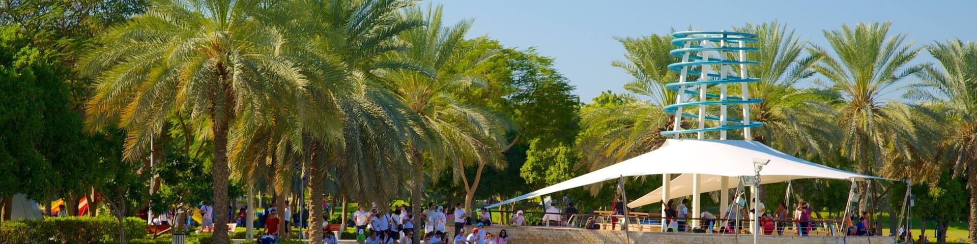 Zabeel Park featuring a park as well as a large group of people