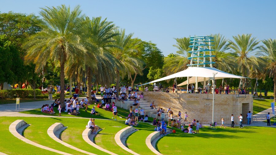 Zabeel Park which includes a garden as well as a large group of people