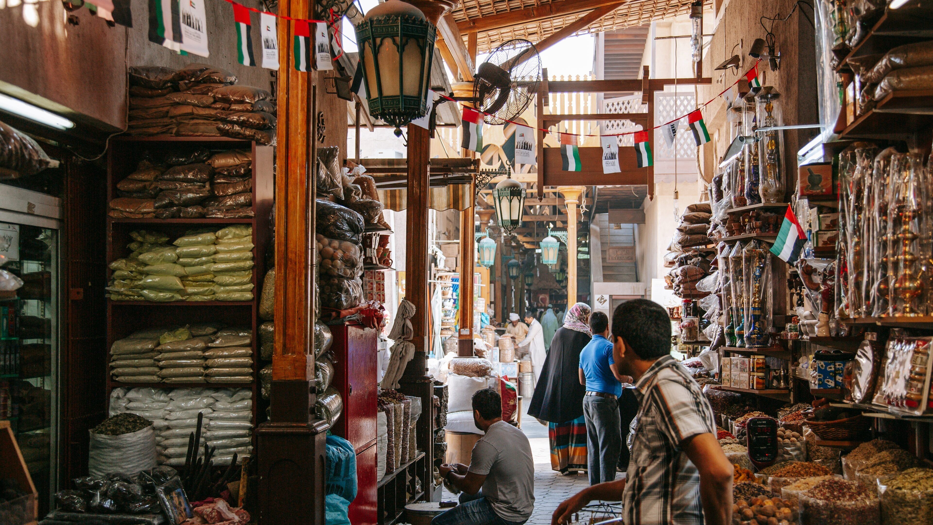 Spice Souk which includes markets and street scenes
