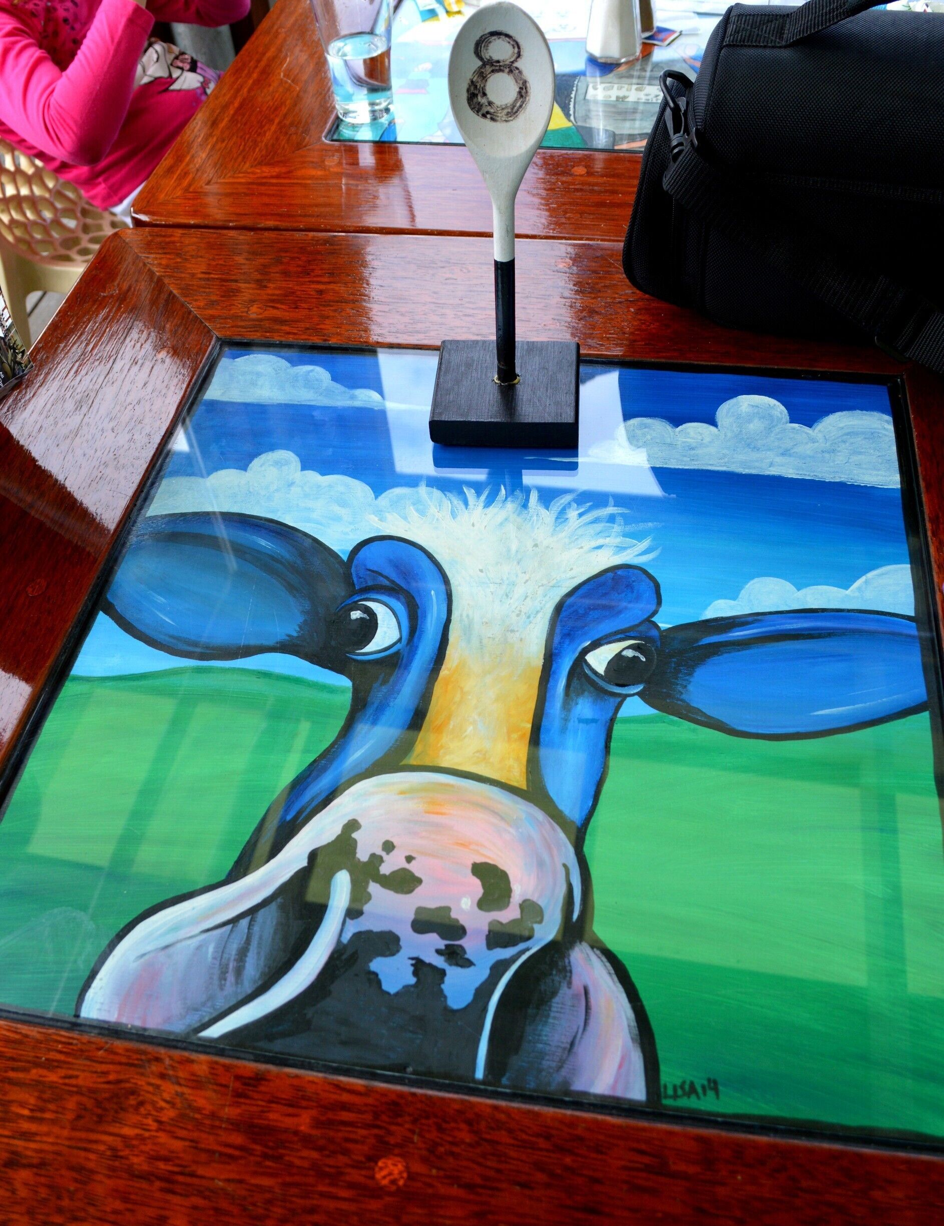 The Wyong Milk Factory Cafe is popular for their wood-fired pizzas and they also make a great cuppa.  
Its a great place to stop and relax.  Plenty of indoor and alfresco seating with such cool table tops what is not to like.  
We also liked the wooden spoon table number idea.  
