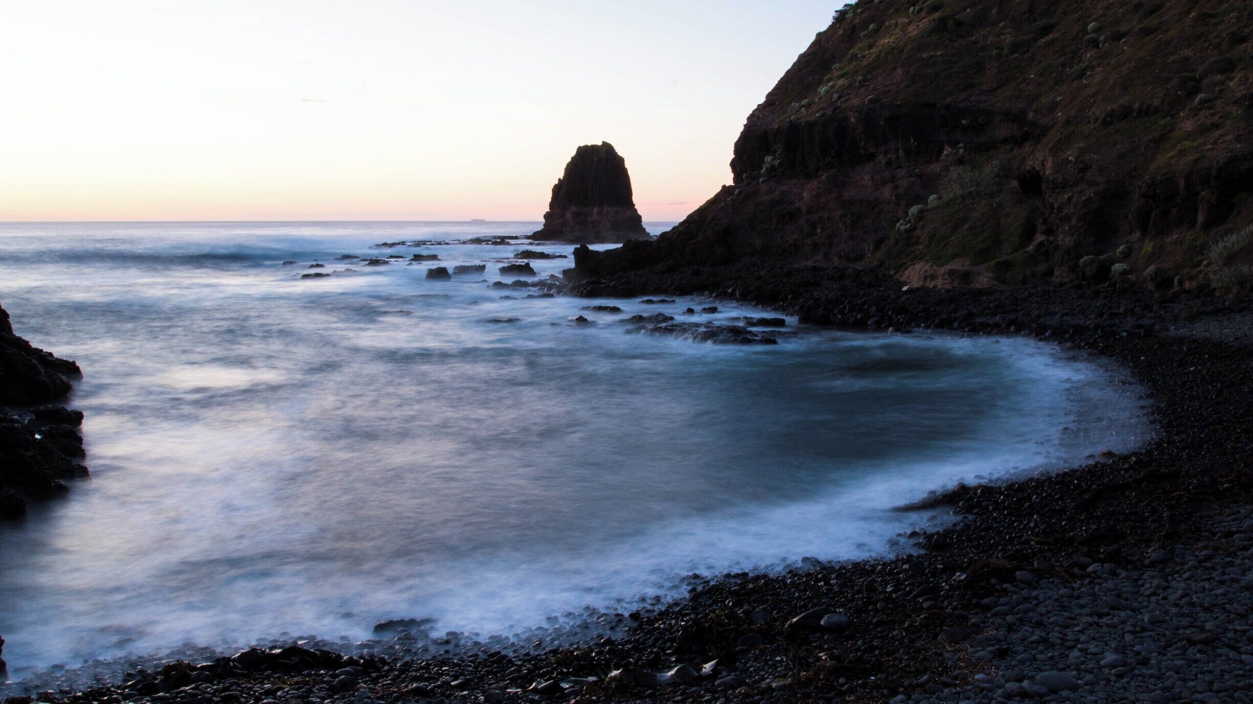 Sunrise on Pulpit Rock at Cape Schanck which overlooks Bass Strait at the southernmost tip of the Mornington Peninsula. It is a rocky point with limestone cliffs and a historic lighthouse built in 1859 that still operates today. It's quite special in some way in that the scenic boardwalk allows you to access the rocky beaches on the Cape along with the rock platforms around Pulpit Rock at the tip of the Cape.

