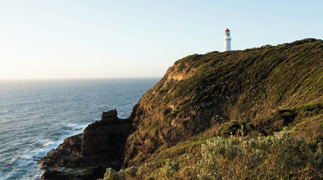 Sunset over Cape Schanck lighthouse which overlooks Bass Strait at the southernmost tip of the Mornington Peninsula. Cape Schanck is a rocky point, with limestone cliffs that has a historic lighthouse built in 1859 that still operates today.