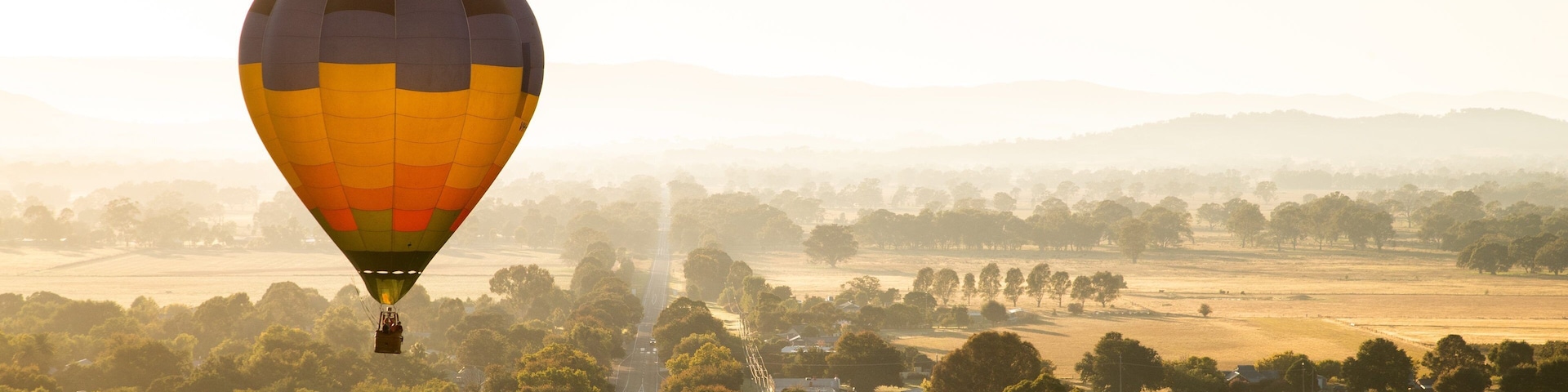 St Maarten and St Martin featuring landscape views, ballooning and a sunset