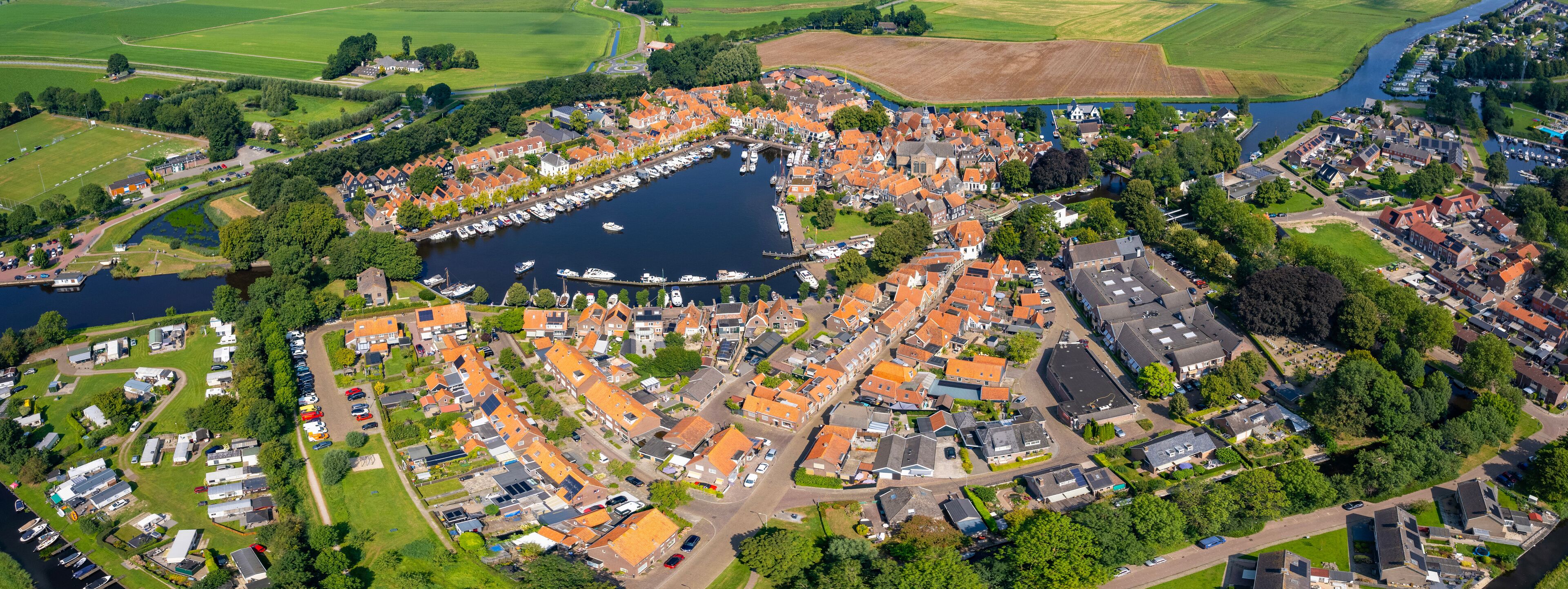 An panorama Aerial view of the old town of the  city Blokzijl in the Netherlands on a sunny day in summer.	
