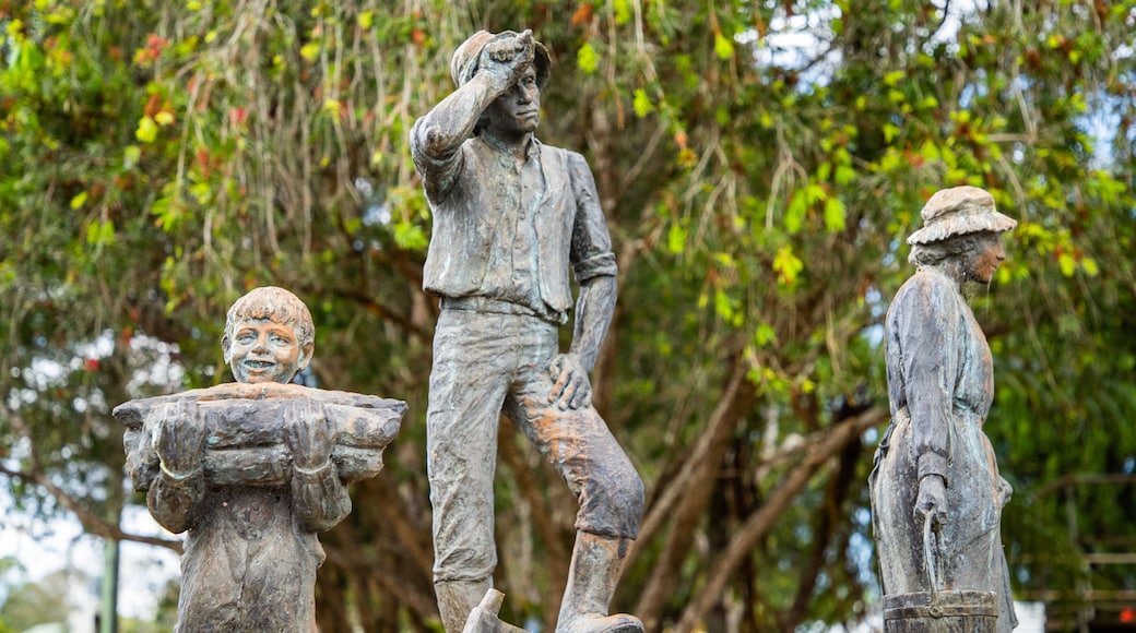 Malanda featuring heritage elements and a statue or sculpture
