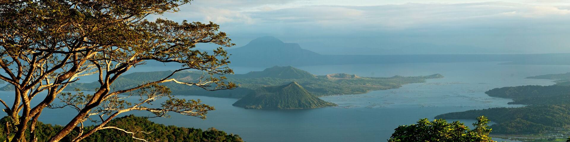Taal Lake in Batangas, Philippines showing Taal Volcano in a panoramic view, late afternoon.
