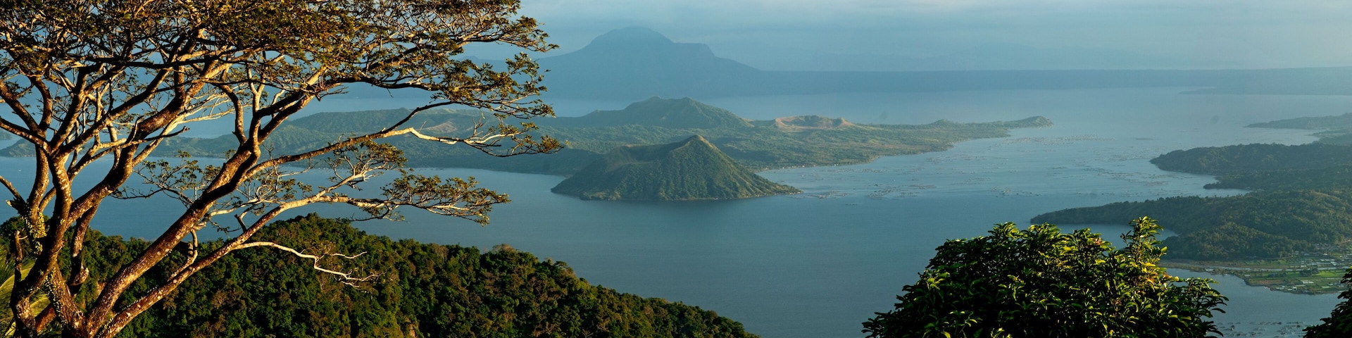 Taal Lake in Batangas, Philippines showing Taal Volcano in a panoramic view, late afternoon.