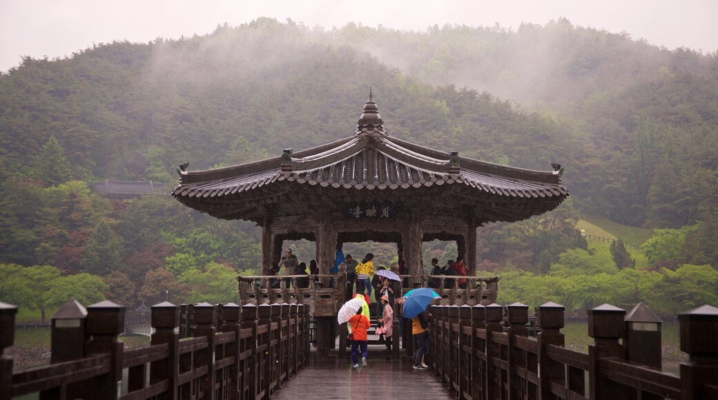 St Maarten and St Martin featuring mist or fog and heritage elements as well as a small group of people