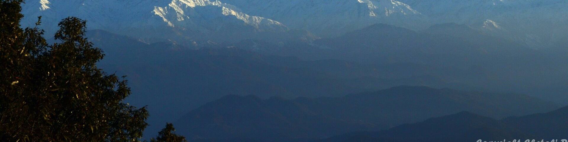 I was melting in nature's arm, with first glimpse of Sunrise."Zero point" is called the 'Sunrise Point'. It's a 2 kms trekking, but looks like 20 kms......haha; when one has to start at 4:30 am in chilling weather of march, with almost 3 layers of clothing(imagine how I managed to walk in that...haha). Zero point gives you the 360 degree view of the Himalayan range ie. Kedarnath Peak, Shivling, Trisul and Nanda Devi. What a beautiful sunrise!! As the golden sun 'Rise and Shine', the Himalayan Peaks shimmer and dances on his commands. So perfect, so eyeful, so scenic.#mountains
#snowcappedmountains#binsar#india#travelbazzinga#trover