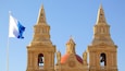 Mellieha Church which includes heritage architecture, religious aspects and a church or cathedral