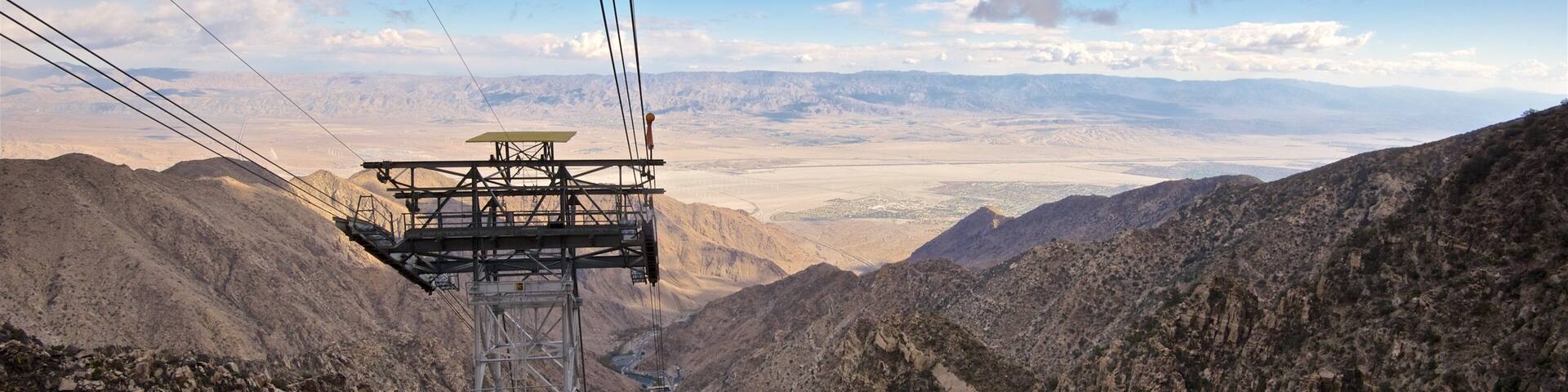 Palm Springs Aerial Tramway featuring landscape views, mountains and a sunset