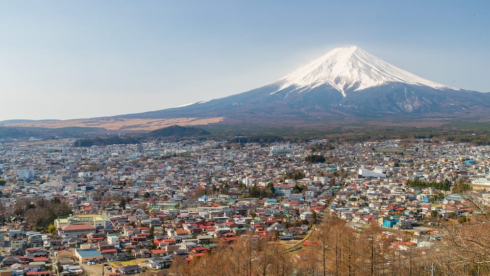 Fujikawaguchiko which includes landscape views, mountains and a city