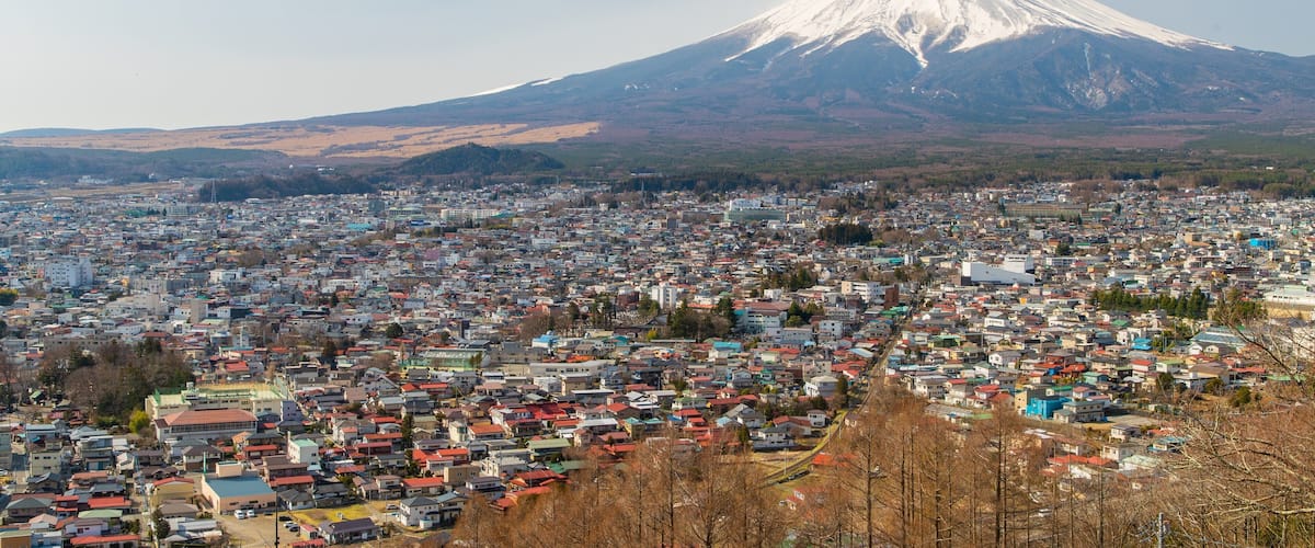 Fujikawaguchiko which includes landscape views, mountains and a city