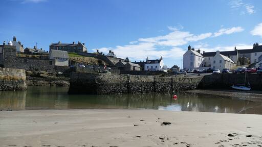 view over the inner harbour at Portsoy looking towards the old fishing and boatbuilding houses