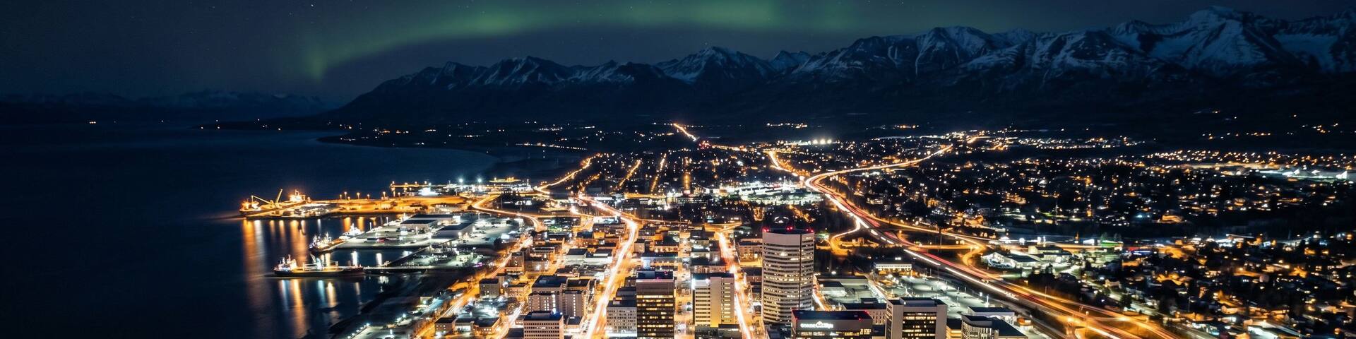Aerial view of city scape at night in Anchorage, Alaska, USA