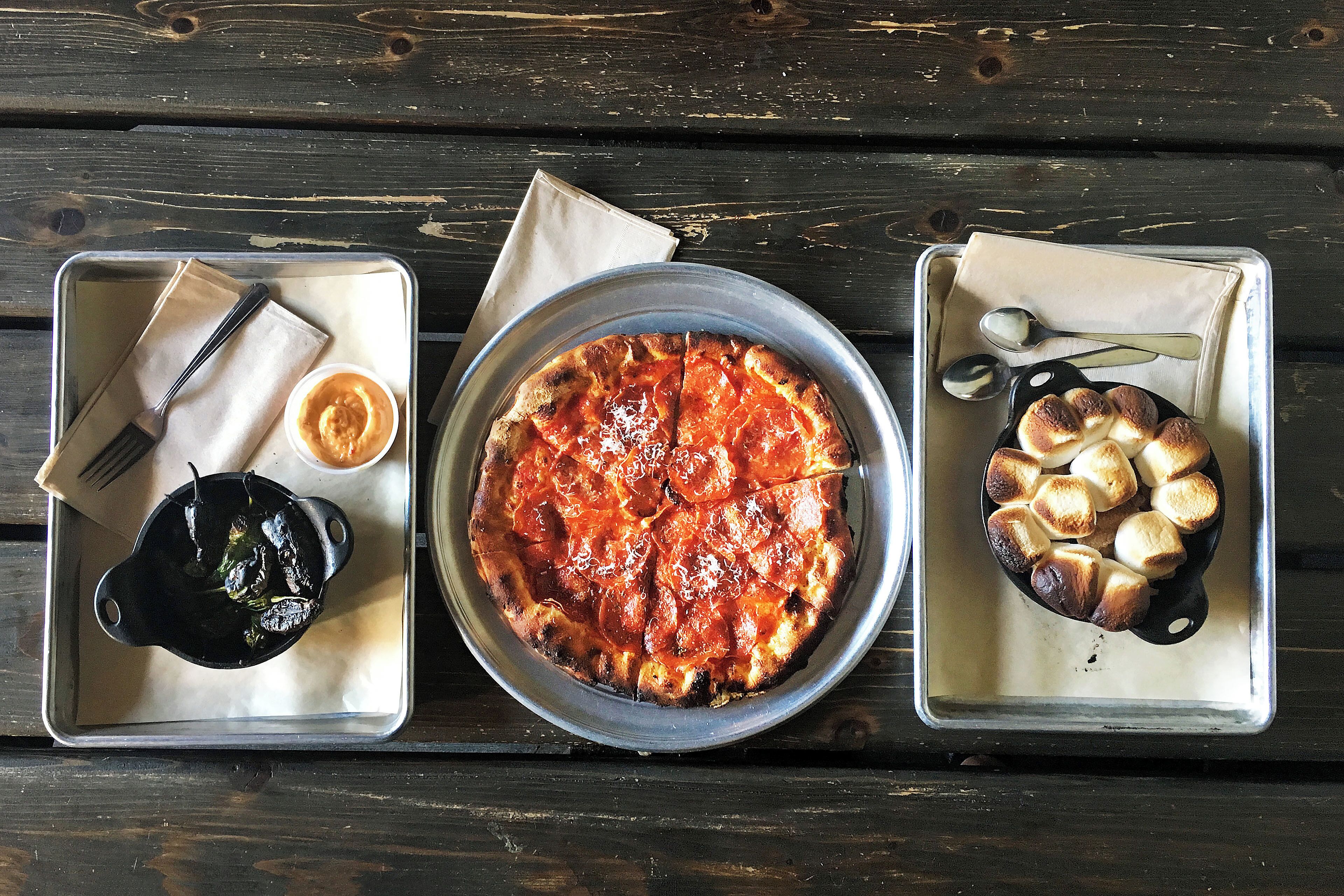 Great locally-sourced comfort food at this casual, friendly restaurant.  The menu rotates with the harvest, but you can't go wrong with their wood-fired pizzas, veggies, or s'mores.  I only wish we'd been around for breakfast too - the House Pastrami Hash sounded amazing.