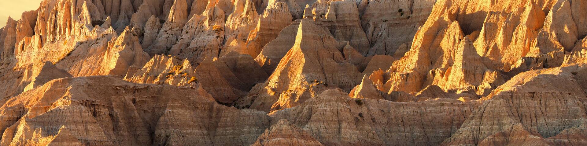 The Jagged Eroded Peaks in Badlands National Park at Sunset
