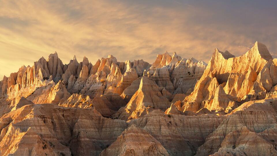 The Jagged Eroded Peaks in Badlands National Park at Sunset