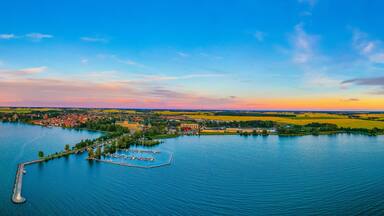 Sunset aerial view of Swedish town Vadstena and its castle