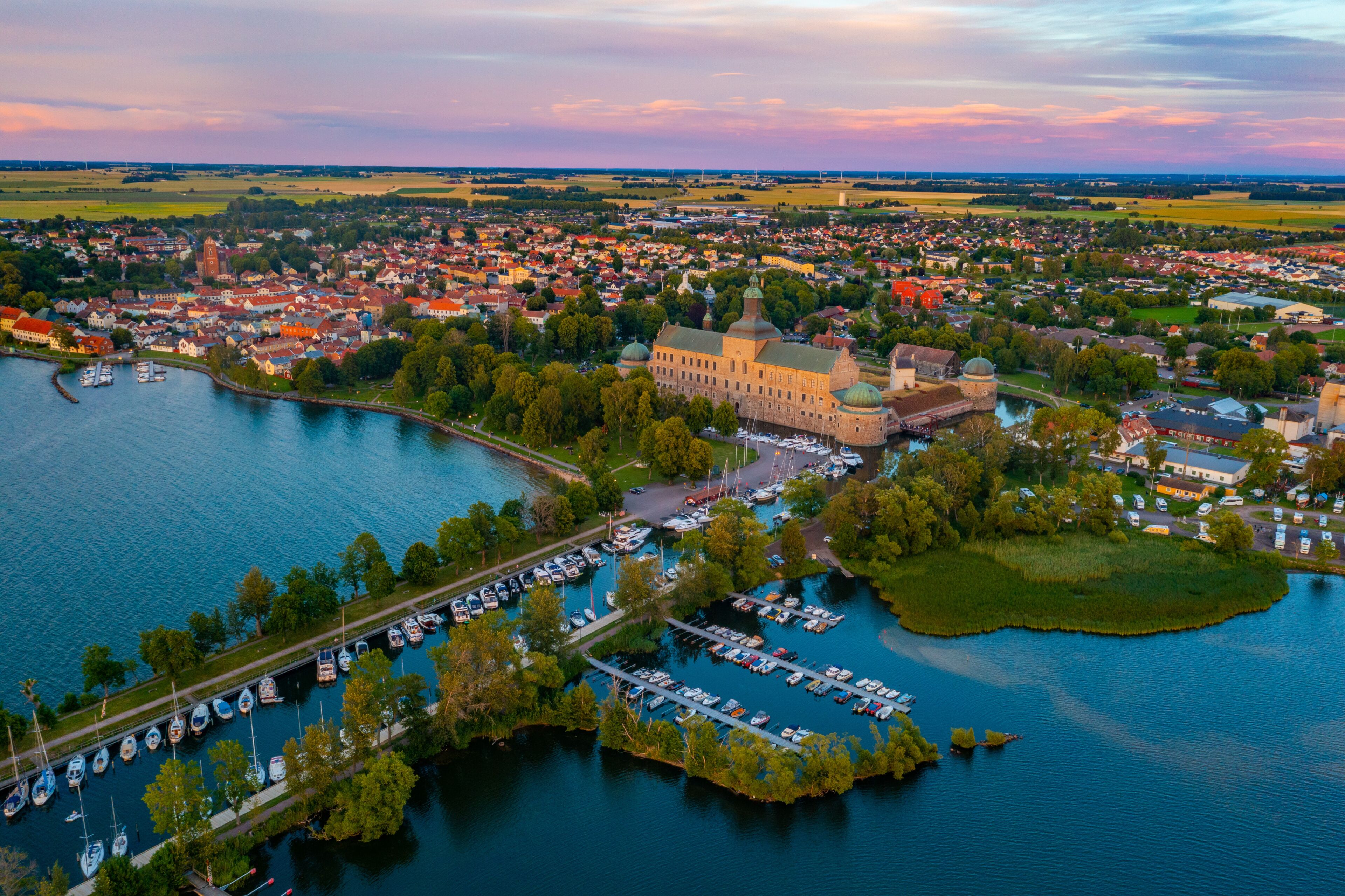 Sunset aerial view of Swedish town Vadstena and its castle