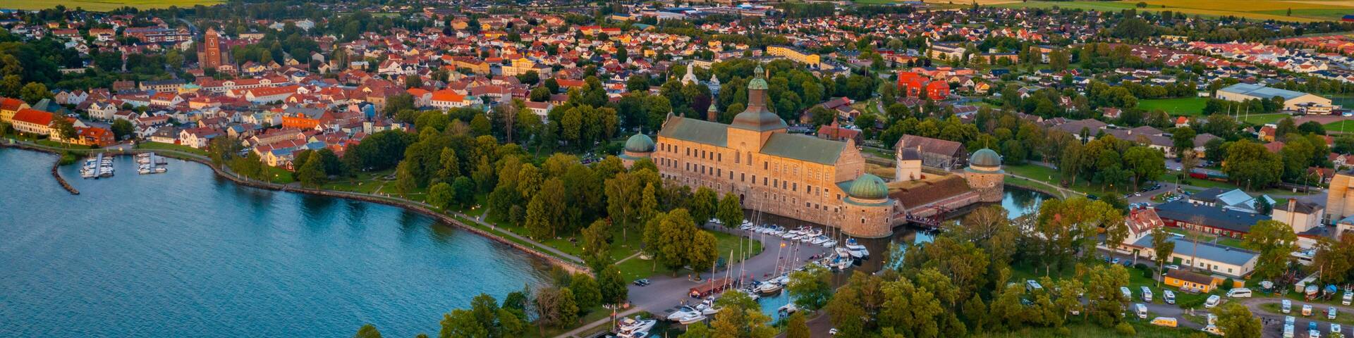 Sunset aerial view of Swedish town Vadstena and its castle