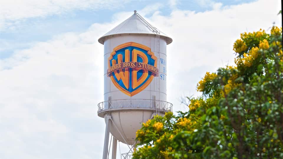 A water tower with the Warner Bros. Studios logo.