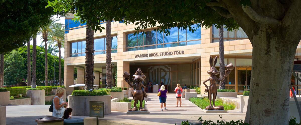 Warner Brothers Studio which includes a statue or sculpture, outdoor art and a park