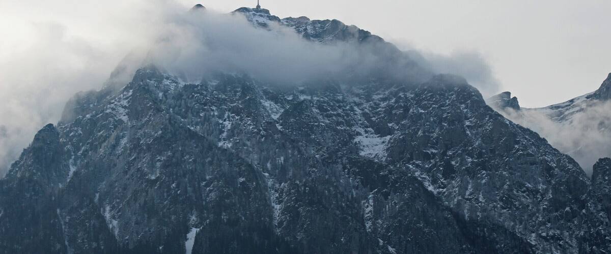 Caraiman Cross as seen from Busteni in the Bucegi Mountains