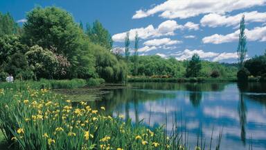 Westbury featuring a lake or waterhole and a park