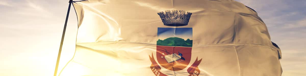 Gravatai of Brazil flag waving on the top sunrise mist fog