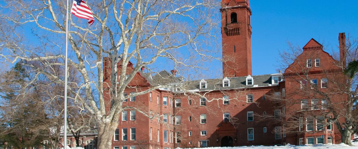 Wells College Tower and Flag in winter