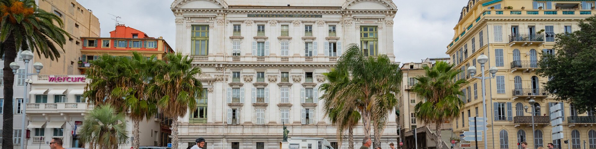 Nice Opera featuring heritage architecture and cycling as well as a couple