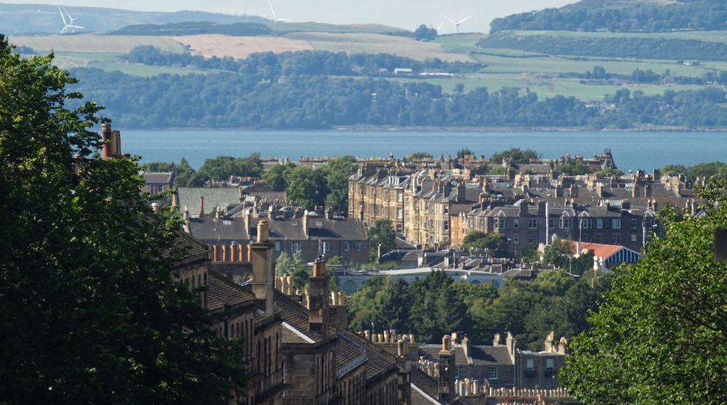A landscape view of the residential area of Broughton in Edinburgh, Scotland, UK and the coast of Fife in the background with visible heat rising from a heatwave.