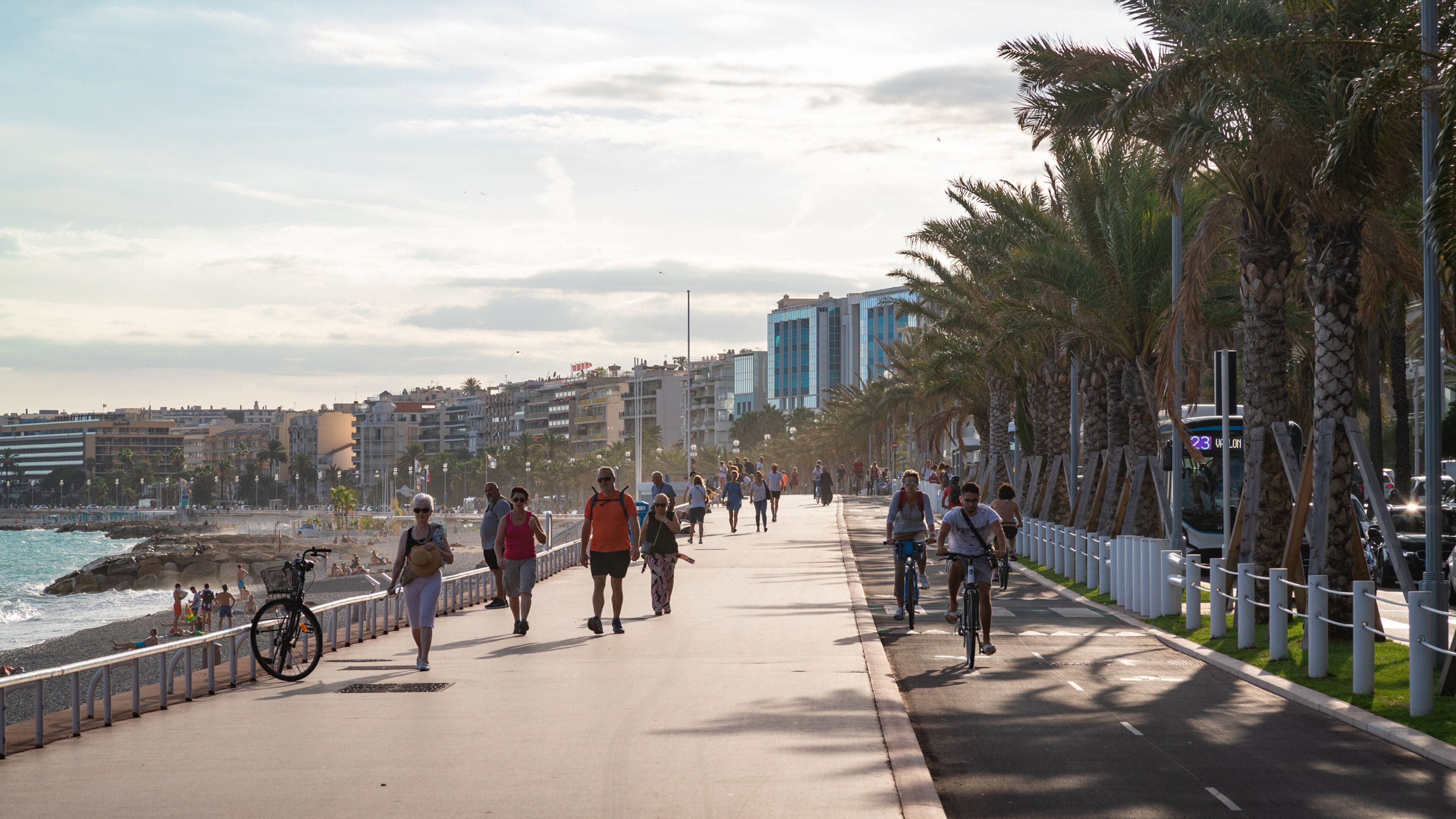 Les Baumettes showing a coastal town as well as a small group of people