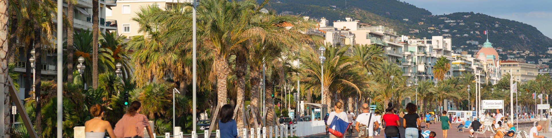 Les Baumettes featuring a coastal town as well as a small group of people
