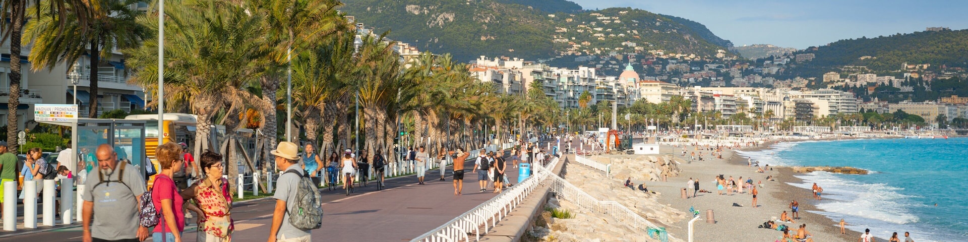 Les Baumettes featuring a coastal town as well as a small group of people