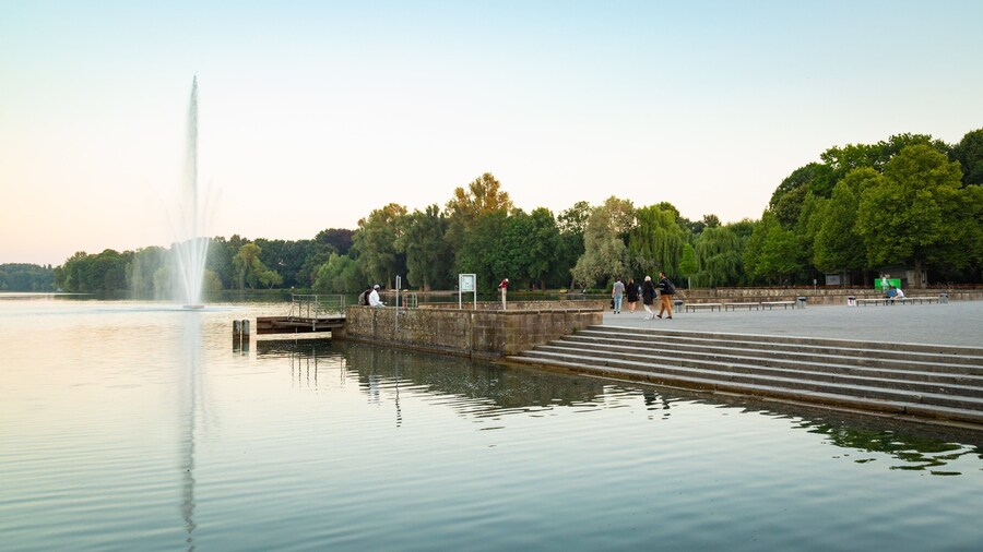 Maschsee which includes a sunset, a fountain and a river or creek