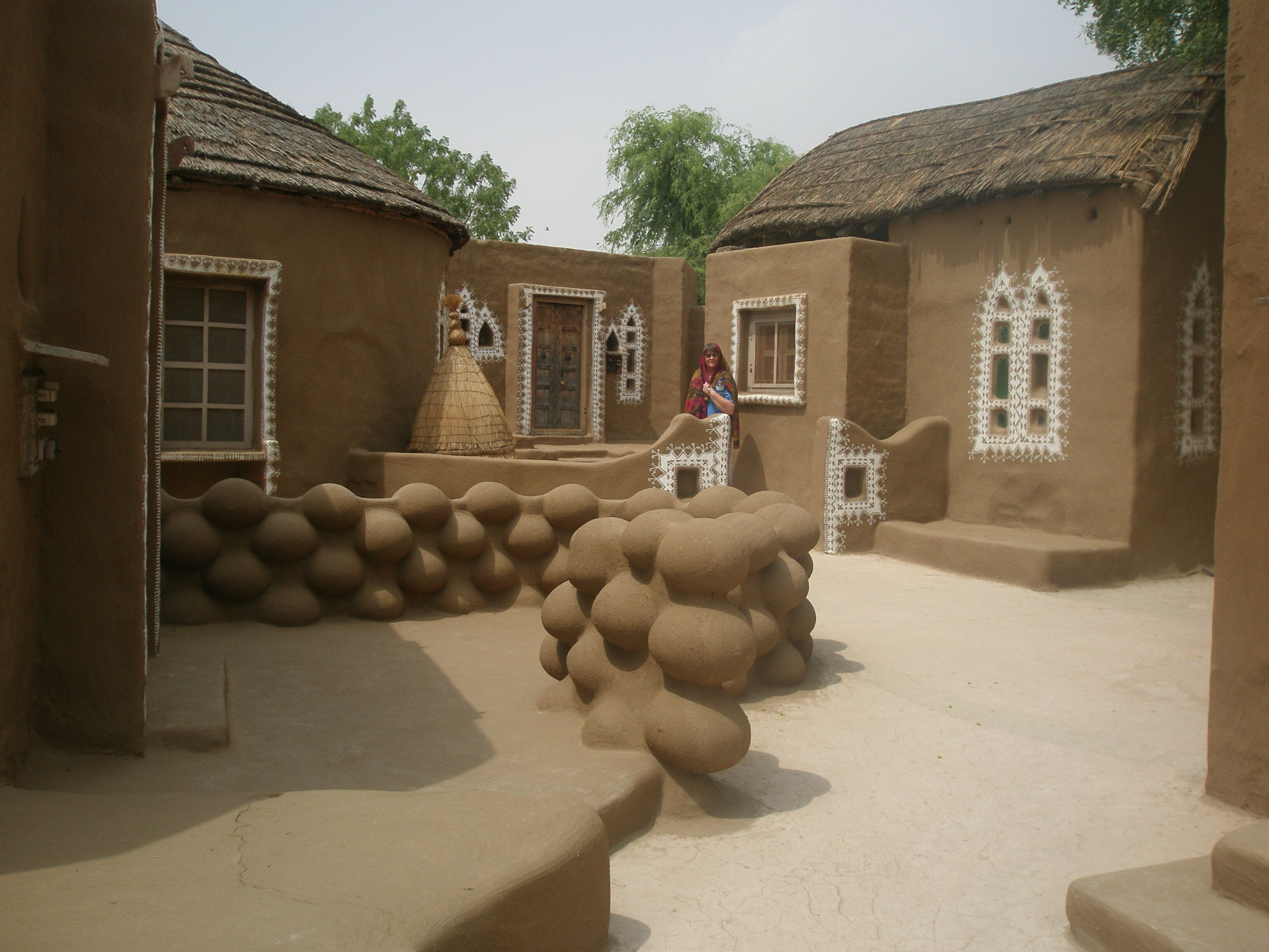 Unique accommodation in Mandawa - brick huts covered in mud inside & out and decorated with white paintings.  Enjoy a desert view from the swimming pool.