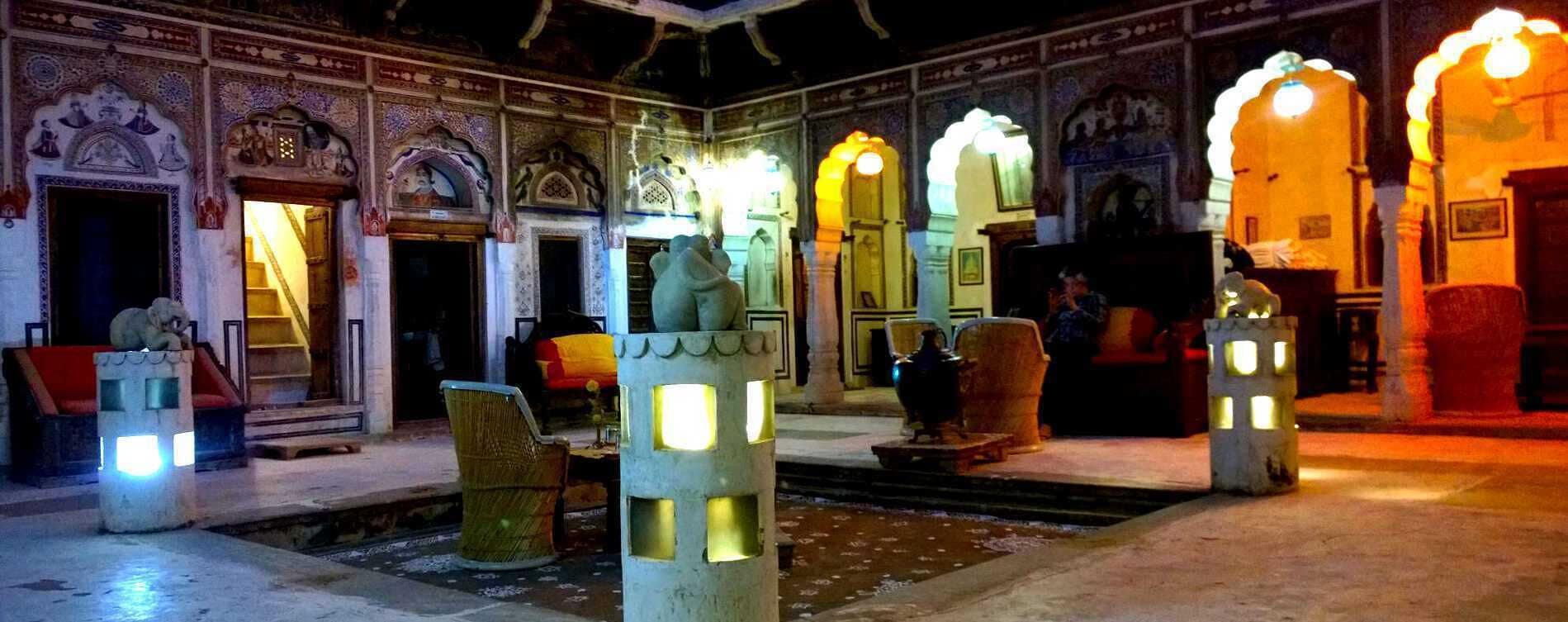 Hotel Mandawa Haveli is one of the best heritage hotel in Mandawa having a history of its own. The hotel provides you the experience of both the traditional as well as the modern amenities blended into one. A Marwari Jeweler had built this haveli for his family in the 18th century. This was purchased by Mr. Dinesh Dhabhai in 1984. Initially the family operated a handicrafts shop from here but gradually converted it into a heritage haveli. Having started with just one room, today the Hotel has 20 well appointed rooms. Each of the rooms have unique traditional names including Gopika, Kanha, Mormukut, Gwala, Nagesh etc. The hotel has three dine in restaurants with different gastronomical delights and cuisines to choose from. The hotel keeps its promise of providing you a lifetime experience to relish throughout your life.