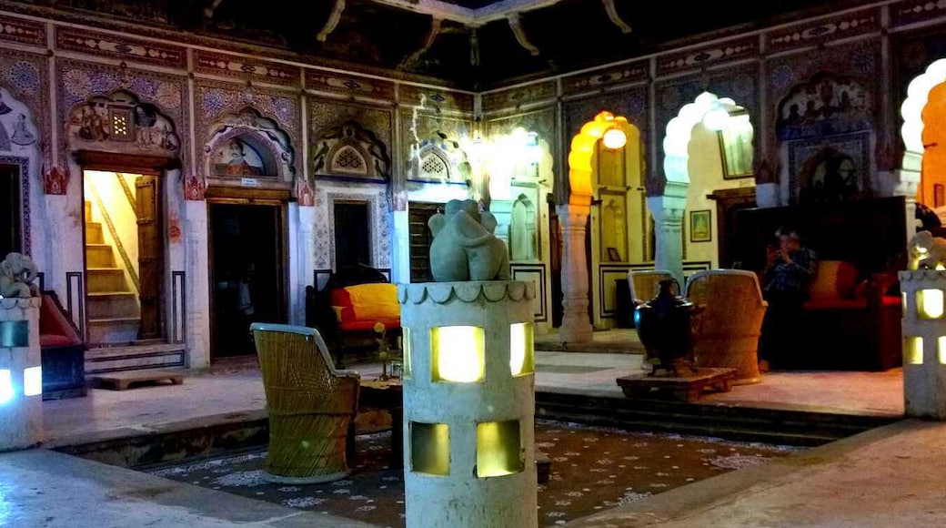 Hotel Mandawa Haveli is one of the best heritage hotel in Mandawa having a history of its own. The hotel provides you the experience of both the traditional as well as the modern amenities blended into one. A Marwari Jeweler had built this haveli for his family in the 18th century. This was purchased by Mr. Dinesh Dhabhai in 1984. Initially the family operated a handicrafts shop from here but gradually converted it into a heritage haveli. Having started with just one room, today the Hotel has 20 well appointed rooms. Each of the rooms have unique traditional names including Gopika, Kanha, Mormukut, Gwala, Nagesh etc. The hotel has three dine in restaurants with different gastronomical delights and cuisines to choose from. The hotel keeps its promise of providing you a lifetime experience to relish throughout your life.