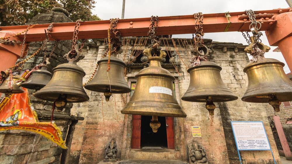 The temple bells inside the ancient Bagnath temple complex built in the Nagara style in the 15th century in the Himalayan town of Bageshwar..