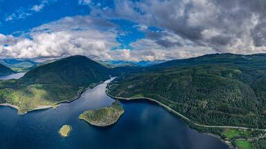 Aerial view of the Fjords and mountains in Norway lake during summertime