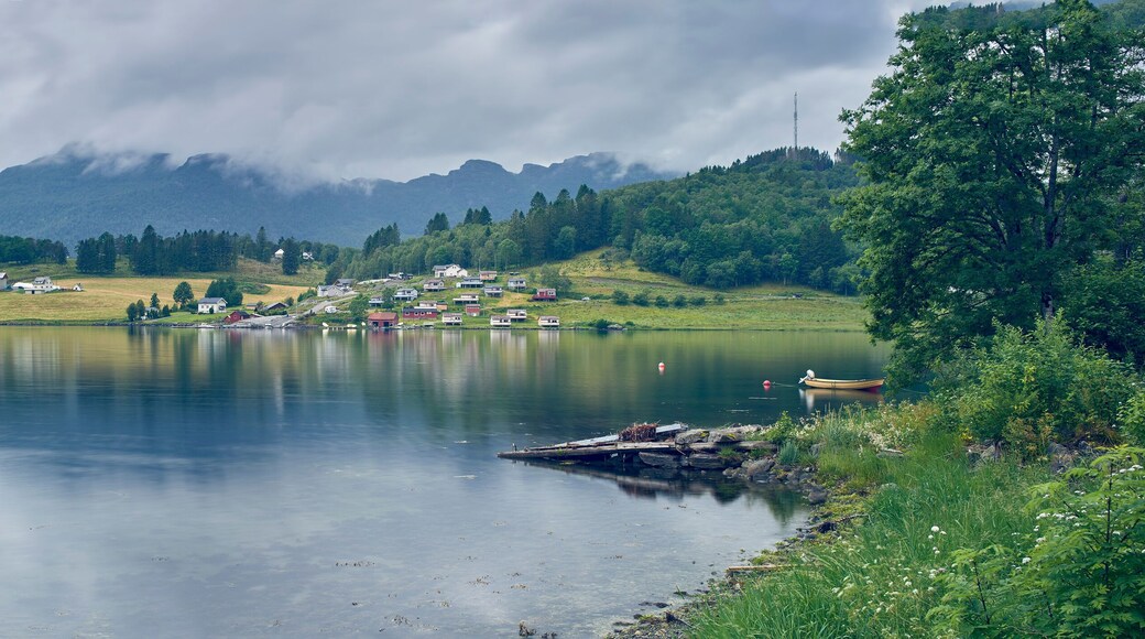 Panoramic view of fjord distant village, Etne, Norway
