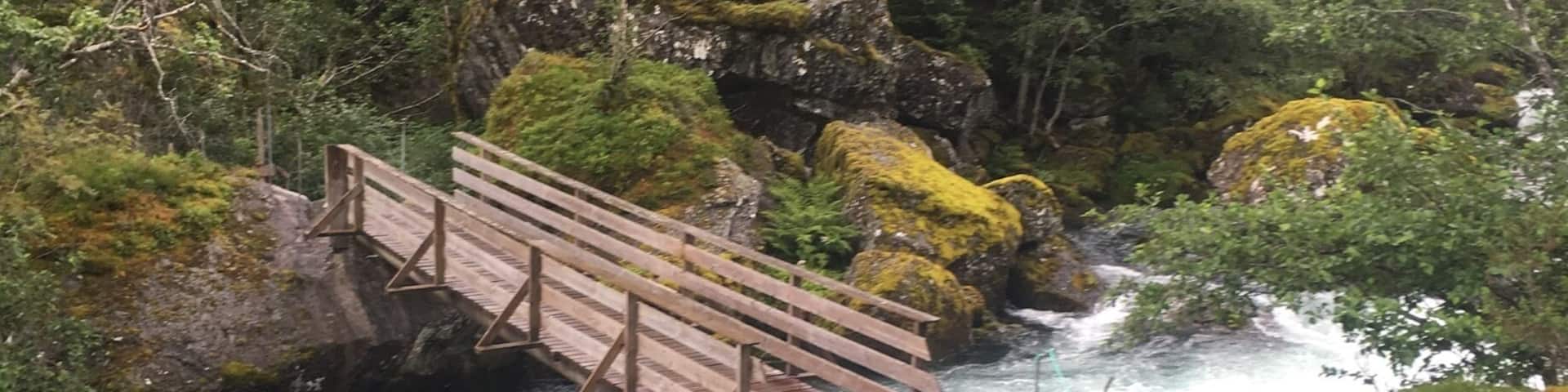 Wooden bridge going over a glacial icefall. This is on a hike from Bondhus/sunndal to Bondhusdalen lake at the bottom of the glacier #takeahike