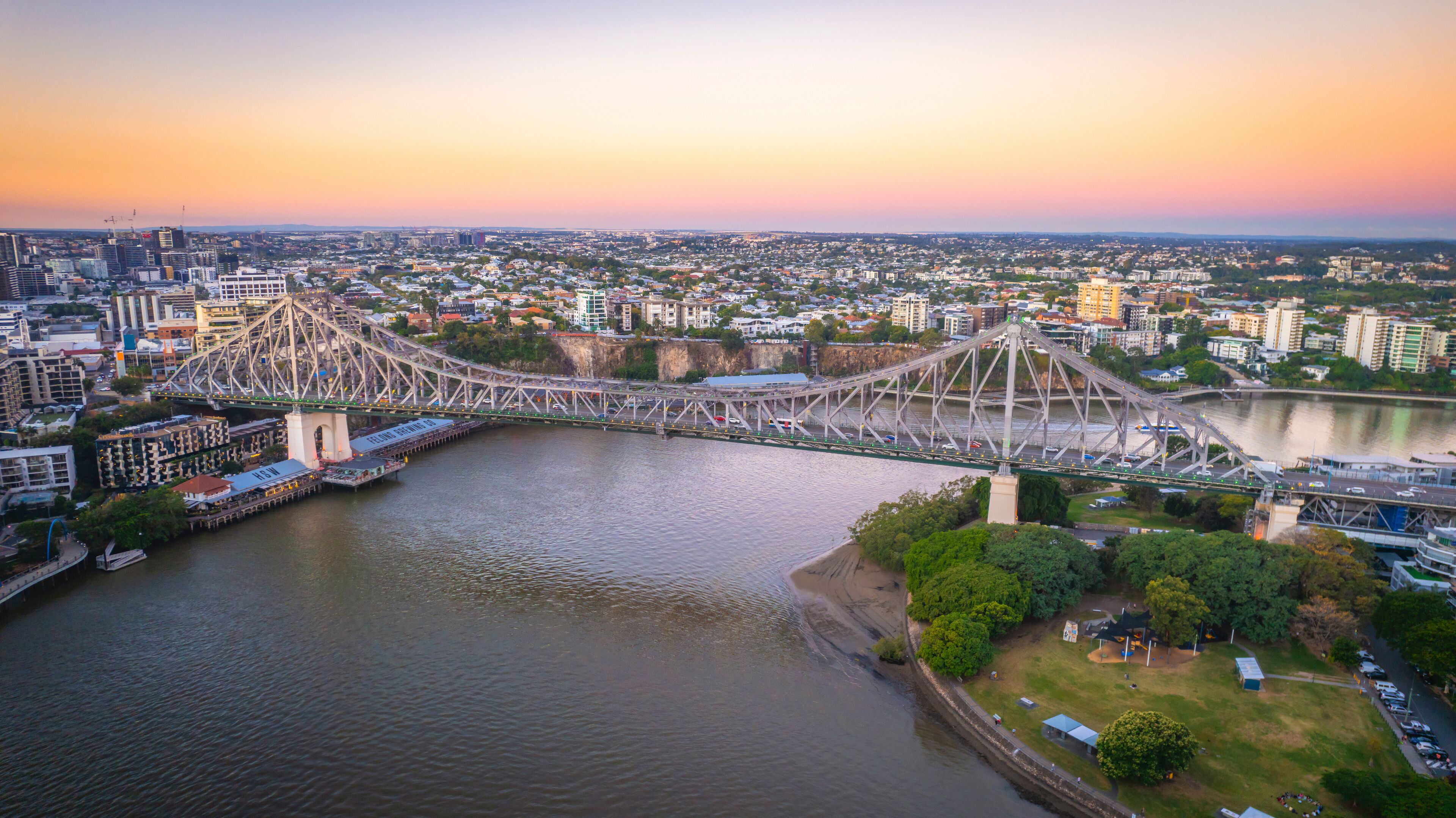 Aerial view of Brisbane City skyline with Story Bridge and river, Queensland, Australia.