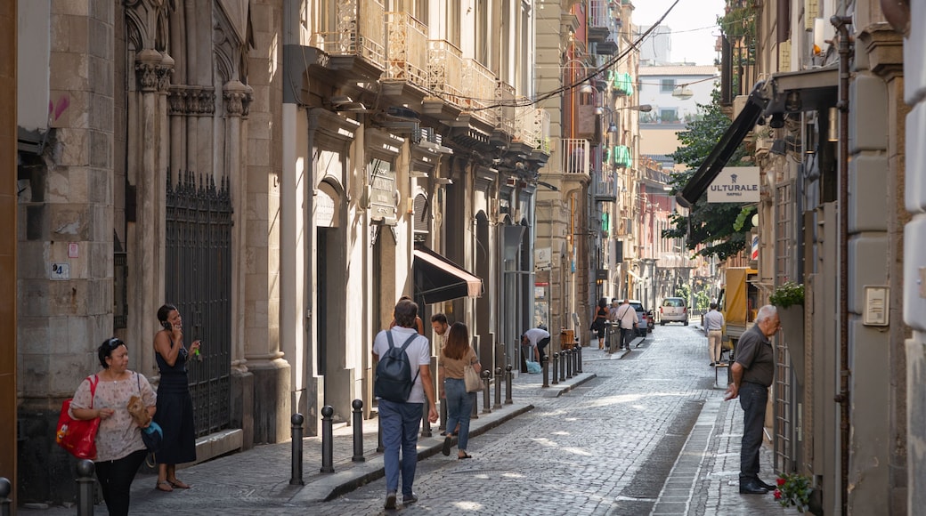 Chiaia showing street scenes as well as a small group of people