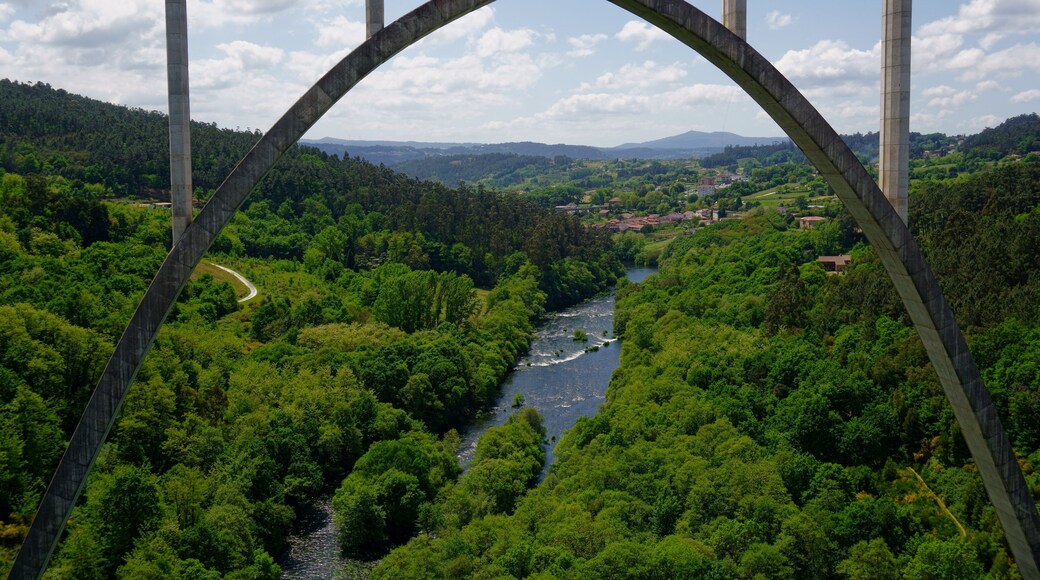 Landscape of Ulla River framed by a train bridge