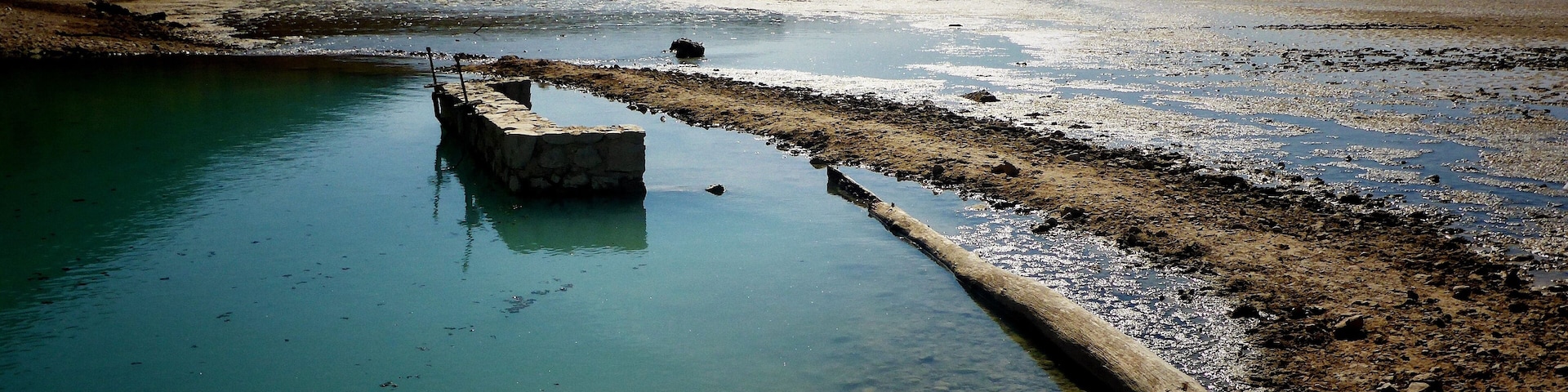The Roman baths at Lake Negratín, Spain have surfaced due to the chronically low water levels. Normally they are under approximately 18m of water.