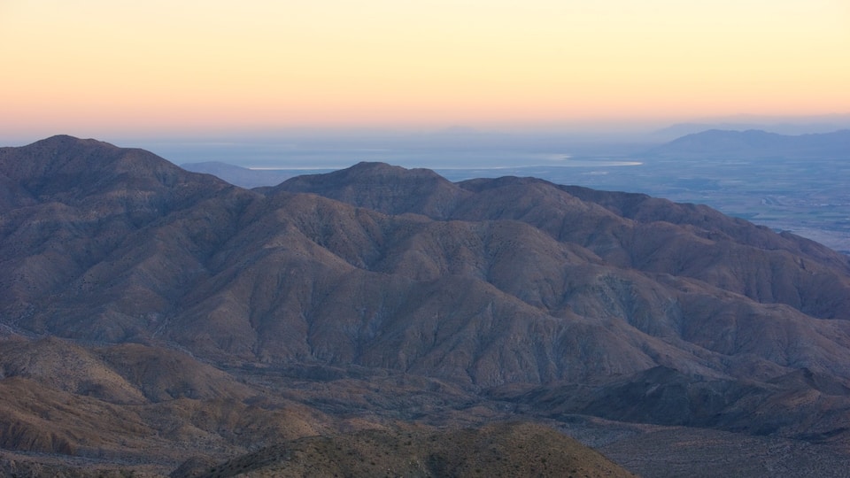 A rugged mountain range with a clear sky.
