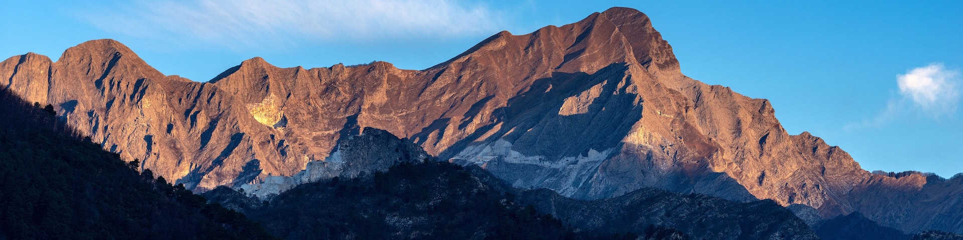 Apuan Alps with white marble quarries of Carrara